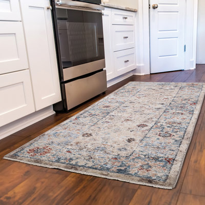 Tapis ivoire Tortelli