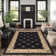Tapis oriental noir / or Clarence