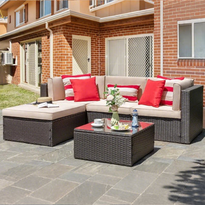 Ensemble de conversation modulaire en rotin 5 pièces avec canapé, coussins, coussins et table en verre