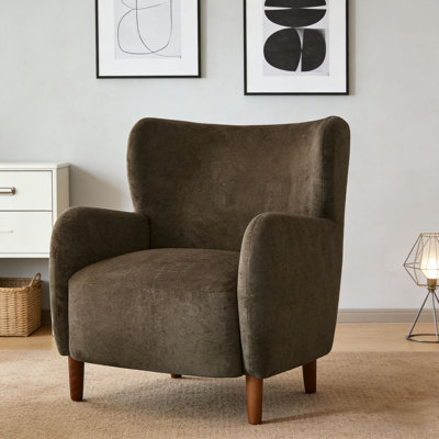 Fauteuil club rembourré à oreilles