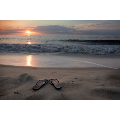 Tongs sur la plage de Sdominick