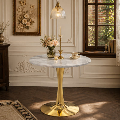 27.6-inch gold coffee table, mid-century modern style dining table, accommodates 2-4 people, featuring a round light gray textured marble tabletop, suitable for various settings.