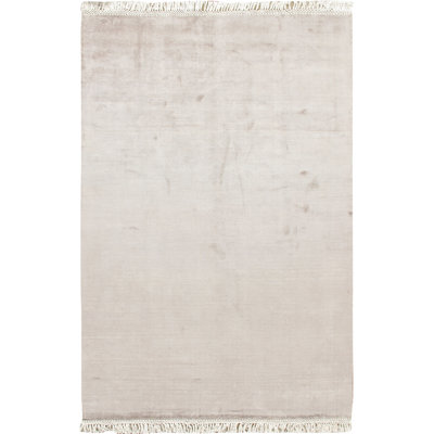 Simplicity Chic Solid Area Rug in Beige
