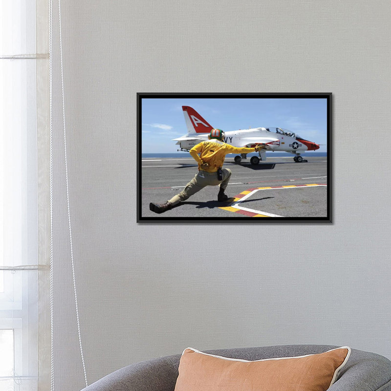 " Shooter Signals To A T-45C Goshawk As It Launches From USS George HW Bush " by Stocktrek Images, 18" H x 26" W x 1.5" D
