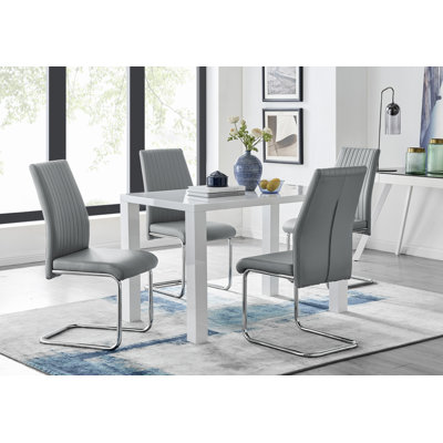 Eubanks High Gloss 4 Seat Rectangular Dining Table Set with Faux Leather Upholstered Dining Chairs