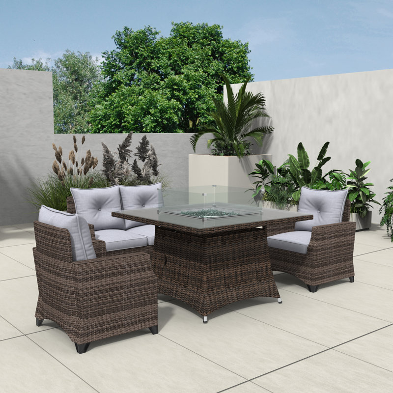 Schwerin Wicker 4 - Person Patio Conversation Set with Cushions