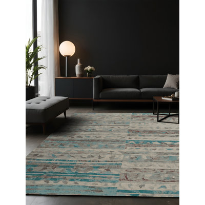 Tapis gris soyeux et moelleux