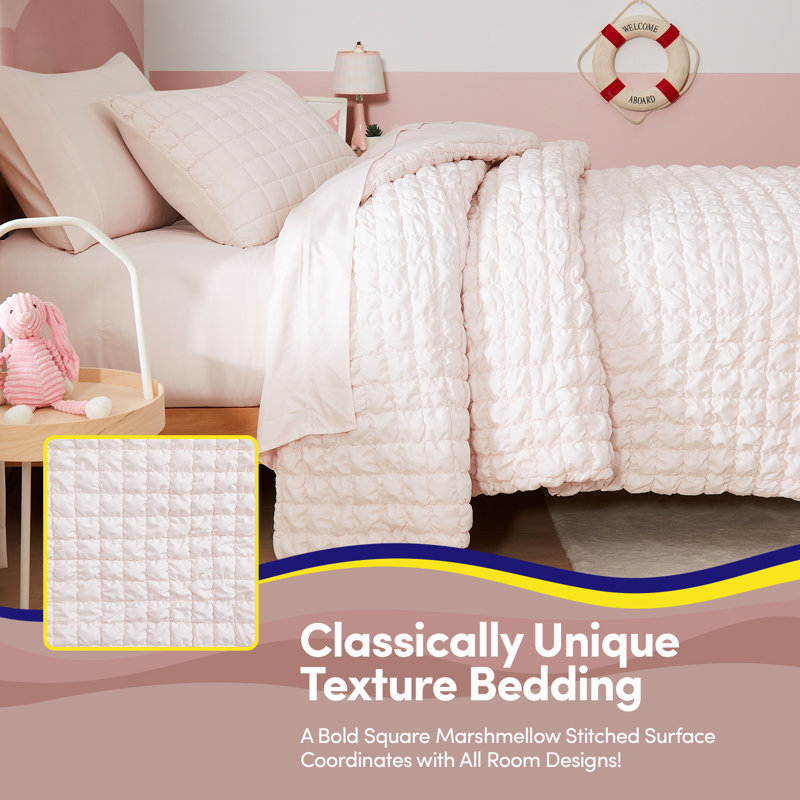 L'ensemble de literie Marshmellow Poufs Solid Kids comprend un ensemble de draps de Sweet Home Collection®, Lit simple