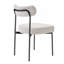 Ensemble de 4 chaises de salle à manger Boucle avec dossier incurvé et pieds en métal robustes pour un confort et un style modernes.