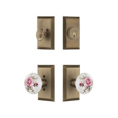 Ensemble d'entrée Nostalgic Warehouse Studio avec bouton en porcelaine rose blanche en laiton antique