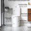 Une toilette, chasse double 1,1 / 1,6, céramique blanche brillante, siège à fermeture en douceur, chasse d'eau pour salle de bain blanche, cuve allongée, fermeture,