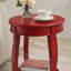Table d'appoint ronde rouge avec tablette inférieure