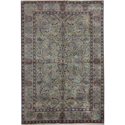 Tapis rouge et or de haute qualité noué à la main