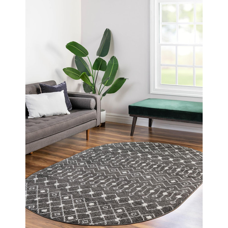 Tapis gris foncé en polypropylène tissé à la machine Briehn, Ovale 5 pi 3 po x 8 pi
