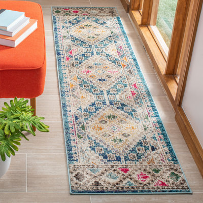Felty Southwestern Dark Blue/Yellow/Beige Area Rug