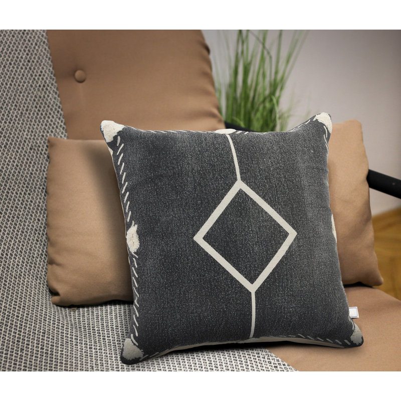 Coussin noir / crème en coton tissé à la main à losanges contemporains