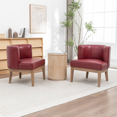 Fauteuil demi-tonneau rembourré Ezra