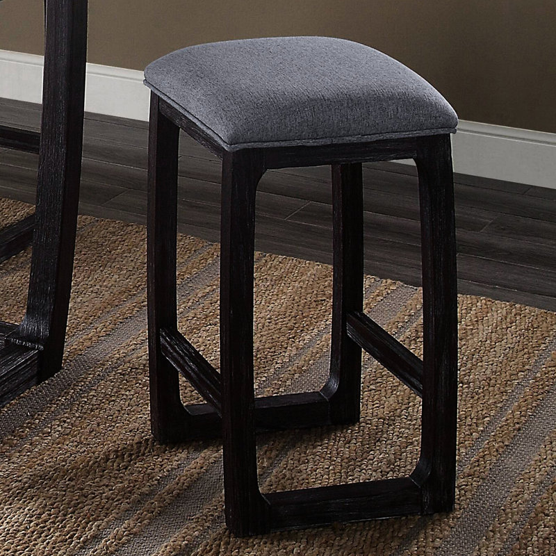 Tabouret de comptoir patiné avec coussin de siège gris