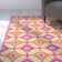Tapis rose/jaune Dorinda