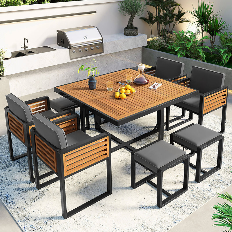 Ensemble de salle à manger 9 pièces en bois d'acacia, ensemble de patio extérieur peu encombrant, 4 chaises rembourrées et 4 repose-pieds et 1 table carrée, pour la cour, le jardin, la terrasse et la piscine, gris