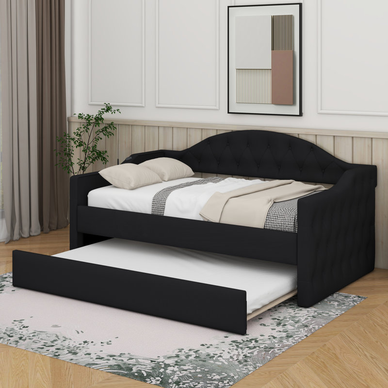 Lit de jour simple tapissier avec couchette et 2 ports USB, canapé-lit capitonné avec bouton sur le dos et passepoil sur les accoudoirs ondulés