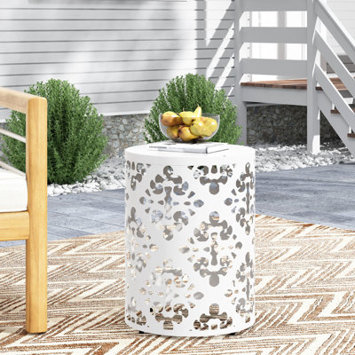 Grande table en fer pour l'extérieur, avec un beau motif floral en métal taillé - Conception cylindrique élégante