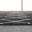 Tapis tissé à motif géométrique Averie-378238351