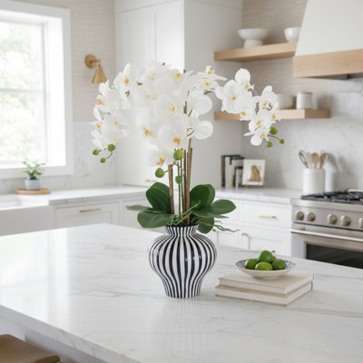 Orchids Arranged in Decorative Ceramic Vase