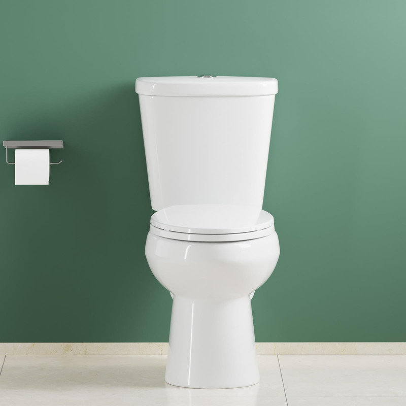 Toilette allongée deux pièces 17 po - double chasse, siège à fermeture silencieuse, 12 po brut, blanc