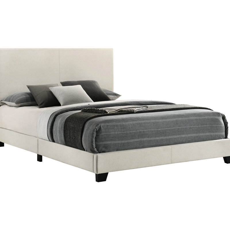Grand lit à panneau tapissier crème avec tête de lit rembourrée, bois d'hévéa et bois d'ingénierie, pieds en bois massif noir, mousse confortable pour installation dans une chambre à coucher moderne, pieds pour