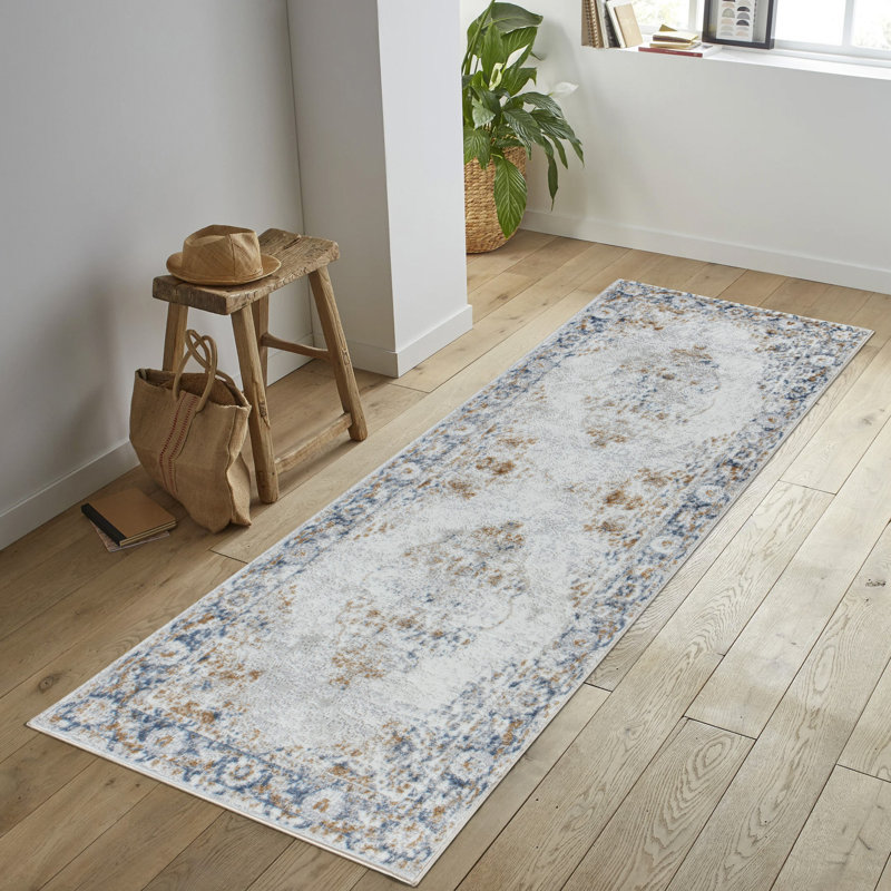 Legacy 5' x 7' Multicolor Stain-Resistant Synthetic Area Rug