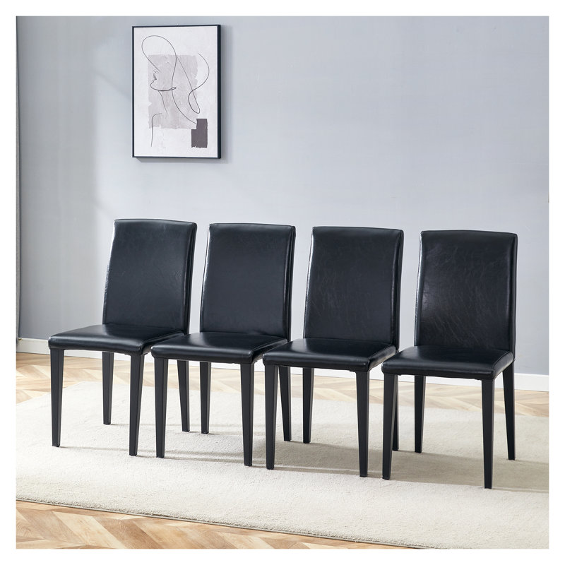 Ensemble de 4 chaises de salle à manger rembourrées en cuir synthétique noir moderne avec pieds robustes en métal