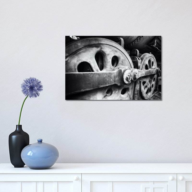 Close Up View Of Wheels Of A Steel Locomotive by George Oze - Wrapped Canvas Print, 30.48 cm H x 45.72 cm W