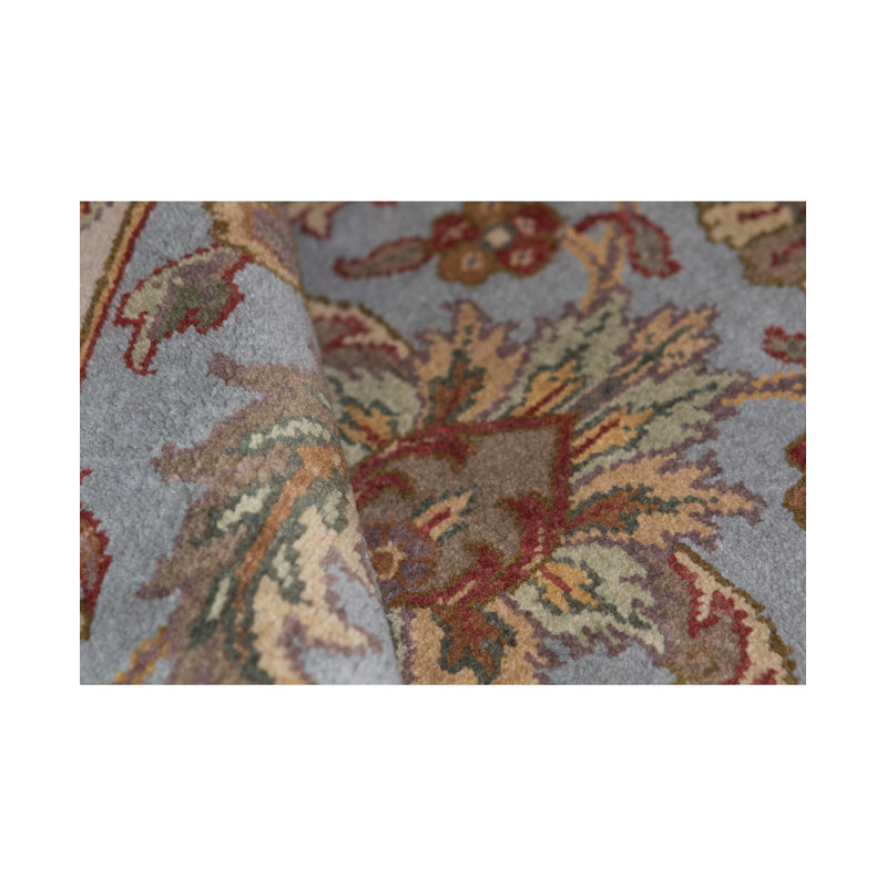 Tapis bleu et ivoire de haute qualité noué à la main