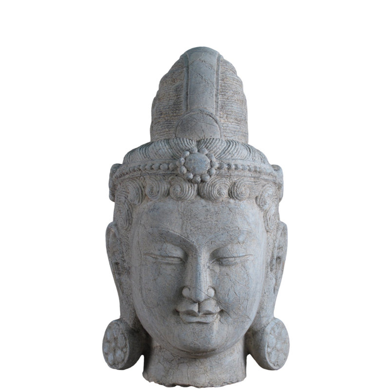A Stone Statue Of Guanyin Head