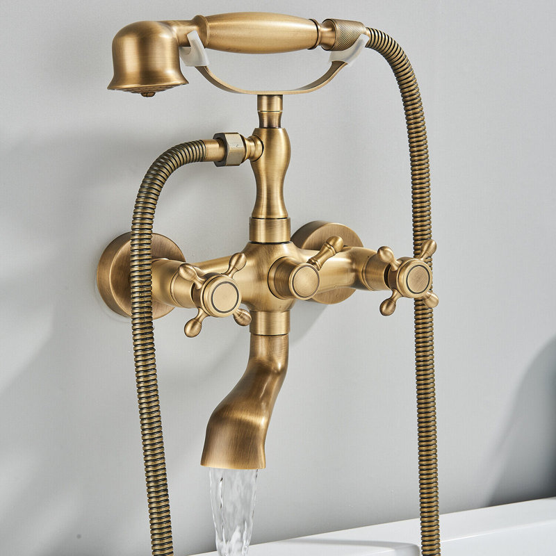 Robinet de baignoire à pattes en laiton antique avec douchette croisée