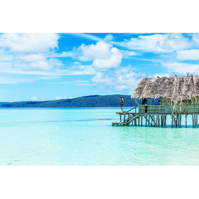 Man Standing in a Beach by Graphixel