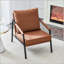 Chaise d'appoint moderne en similicuir avec structure en métal noir robuste-131539470