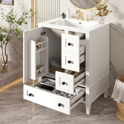 Meuble-lavabo de 24 pouces avec lavabo en céramique intégré, comprenant une tablette double couche montée sur la porte, des tiroirs à fermeture douce et une porte d'armoire à fermeture douce.