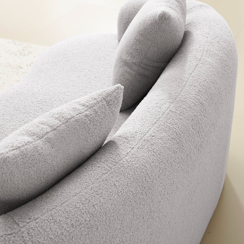 Canapé d'angle gris incurvé avec accoudoirs ronds, 2 places, compression, pour toutes les pièces, sans montage, entretien facile, soutien ergonomique, confort optimal, idéal pour le salon ou le bureau.