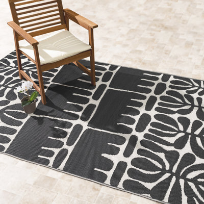 Tapis d'extérieur en paille de plastique imperméable pour terrasse Johppah noir et blanc