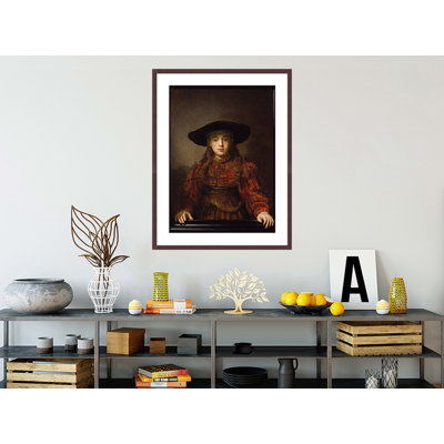 La fille dans un cadre photo par Rembrandt van Rijn - Estampe numérique encadrée