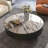Modern simple round rock table-110266413