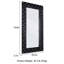 Grand miroir de sol noir capitonné Casmer