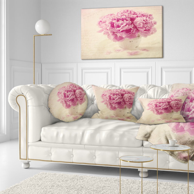 Coussin lombaire en fleurs pivoine sur table