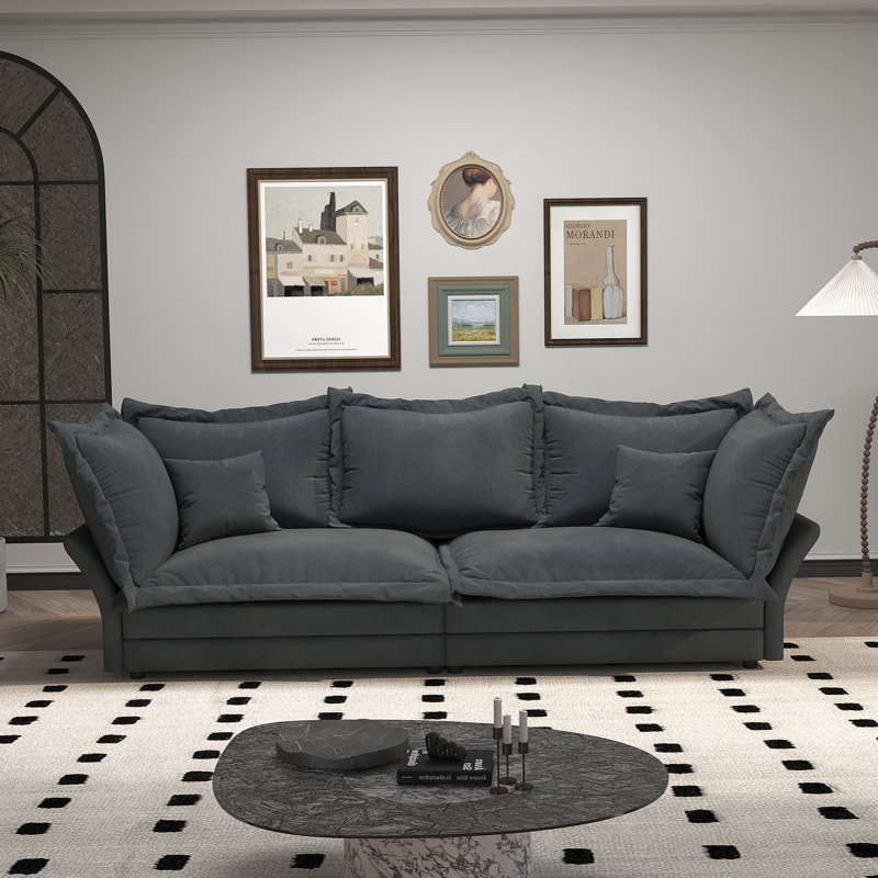 Canapé convertible confortable avec coussins moelleux et conception polyvalente pour divers espaces