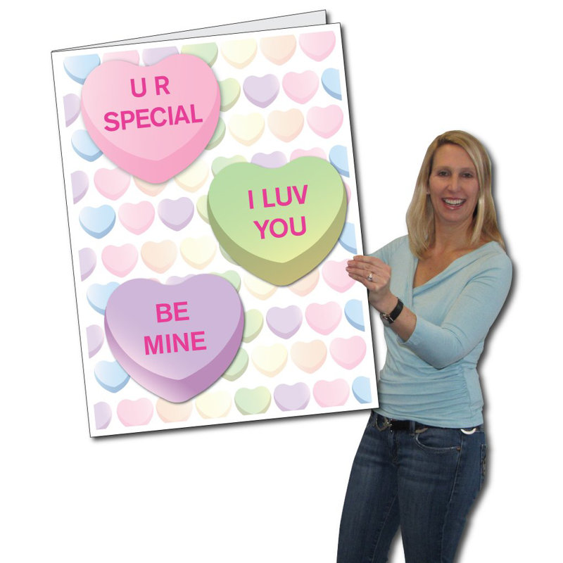 Carte de la Saint-Valentin avec 3 cœurs de bonbons géants