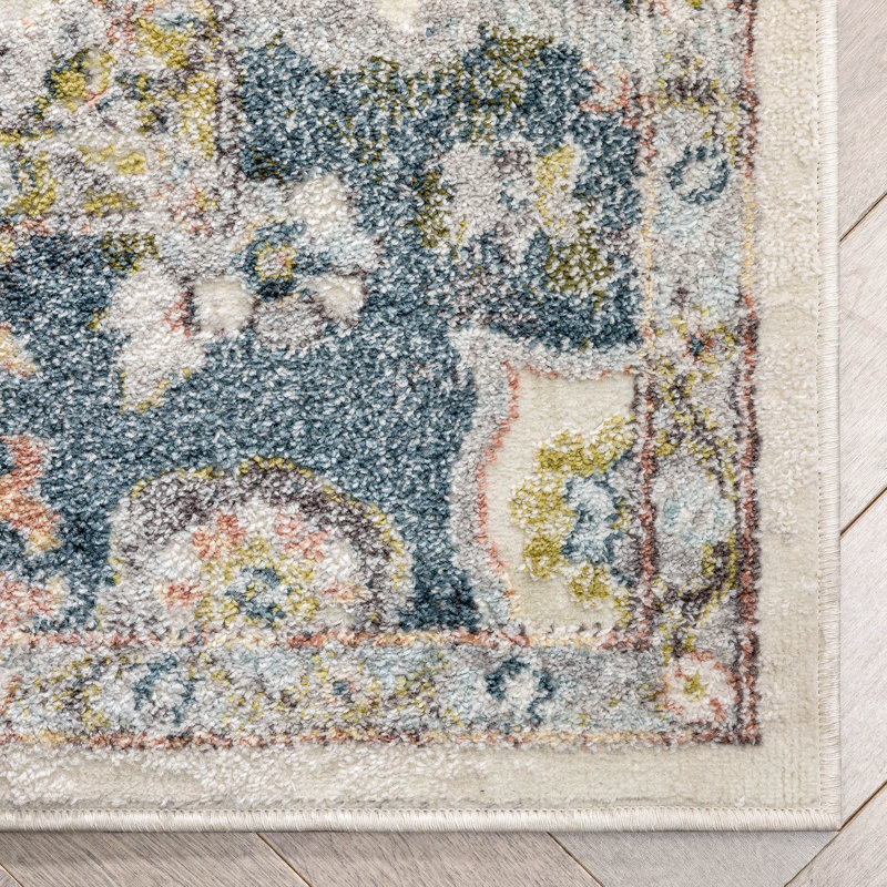 Ivory and Blue Synthetic Oriental Area Rug 5'3" x 7'3"