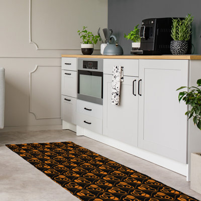 Tapis de zone noir/orange fait main géométrique