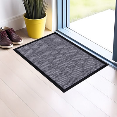 Grand paillasson gris à motif géométrique